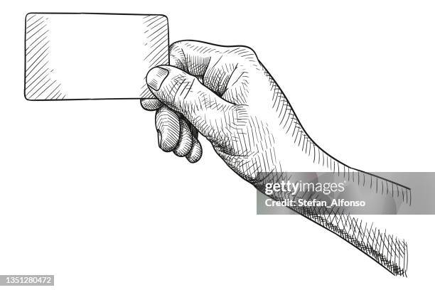 stockillustraties, clipart, cartoons en iconen met vector drawing of a hand holding credit card or business card - visitekaartje