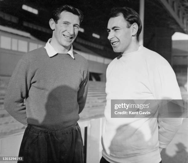Bill Brown and Alan Gilzean of Scotland and Tottenham Hotspur Football Club talking together on 18th December 1964 at the White Hart Lane ground in...