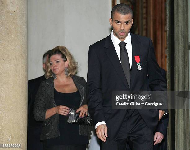 Tony Parker and his mother Pamela Firestone leave the Elysee Palace after he received the Legion of Honor Medal on September 28, 2007 in Paris,...