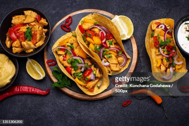 high angle view of food on table - fajita stock pictures, royalty-free photos & images