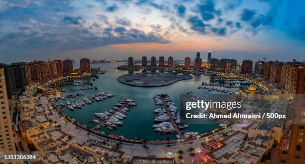high angle view of buildings in city against sky,doha,qatar - tour of qatar fotografías e imágenes de stock