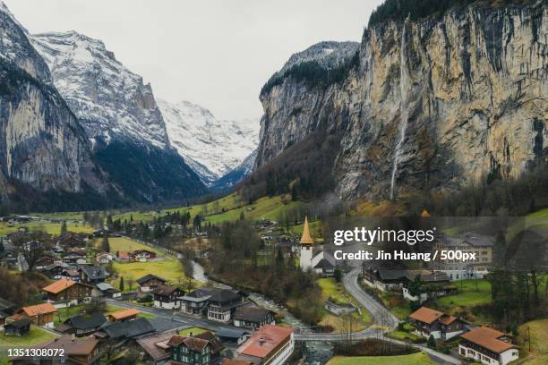 aerial view of townscape and mountains against sky,lauterbrunnen,switzerland - lauterbrunnen stock pictures, royalty-free photos & images