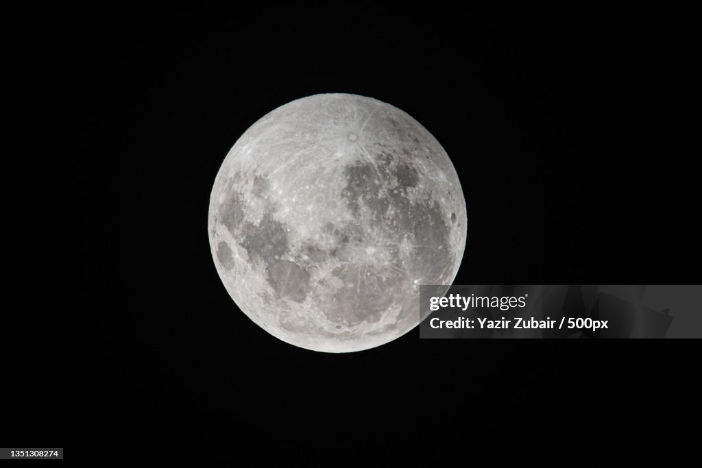Low angle view of moon against clear sky at night,Kandy,Sri Lanka