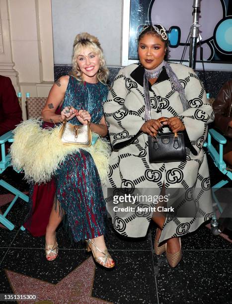 Miley Cyrus and Lizzo are seen on Gucci Love Parade Front Row on November 02, 2021 in Los Angeles, California.