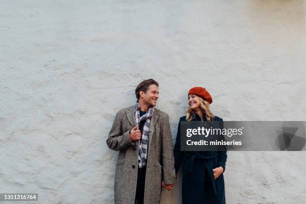 happy couple having fun outdoors - portrait winter stock pictures, royalty-free photos & images