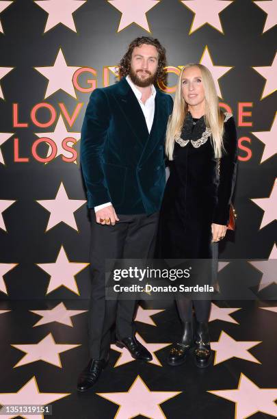 Aaron Taylor-Johnson and Sam Taylor-Johnson arrive at Gucci Love Parade on November 02, 2021 in Los Angeles, California.