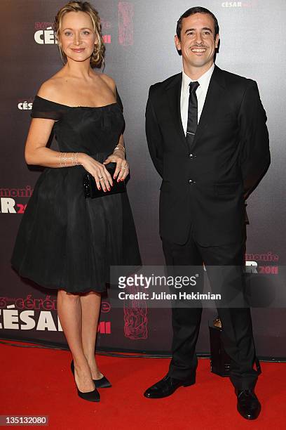 Julie Ferrier and Karim Adda attend the 36th Cesar Film Awards at Theatre du Chatelet on February 25, 2011 in Paris, France.