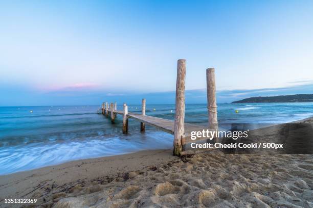 scenic view of beach against clear sky,plage de pampelonne,france - saint tropez beach stock pictures, royalty-free photos & images