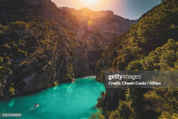 scenic view of lake and mountains against sky,gorges du verdon,france - gorges du verdon stock pictures, royalty-free photos & images