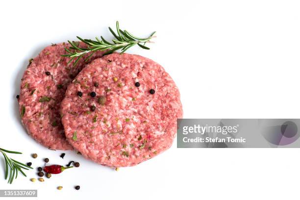 two raw burgers - burger above stock pictures, royalty-free photos & images