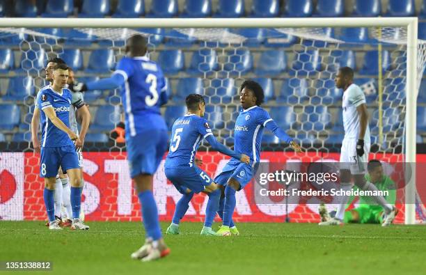 Angelo Preciado celebrates with teammate Gerardo Arteaga of K.R.C Genk after an own goal by Tomas Soucek of West Ham United during the UEFA Europa...