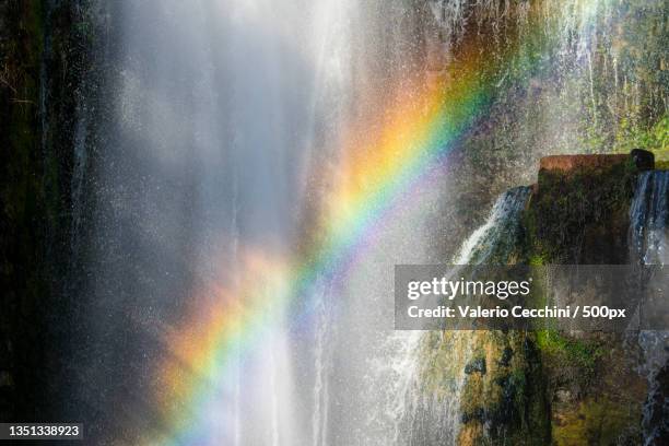 scenic view of rainbow over waterfall,tivoli,lazio,italy - tivoli stock pictures, royalty-free photos & images