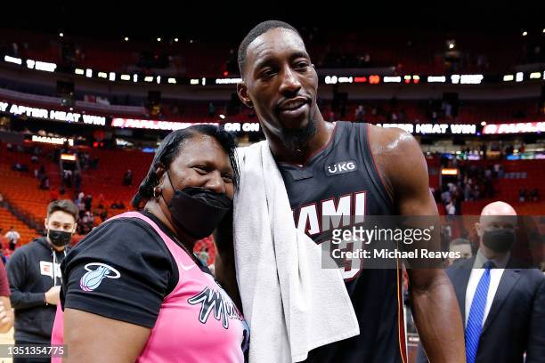 Bam Adebayo of the Miami Heat poses for a photo with his mother, Marilyn Blount, after the game against the Charlotte Hornets at FTX Arena on October...