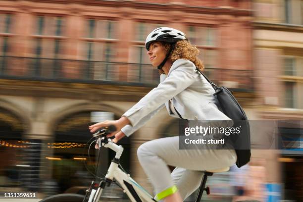 cycling commuter - rush hour stock pictures, royalty-free photos & images