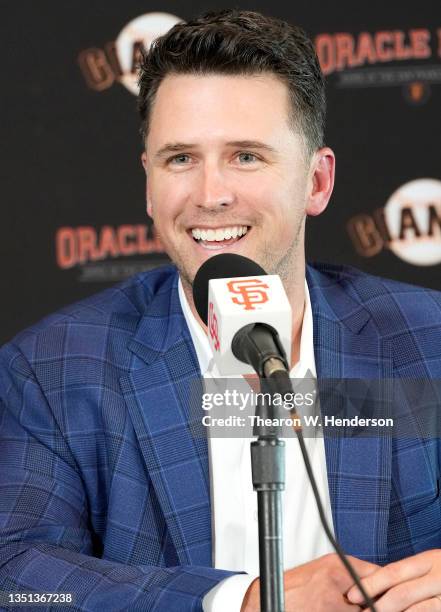 Buster Posey of the San Francisco Giants speaks at a press conference announcing his retirement from Major League Baseball at Oracle Park on November...