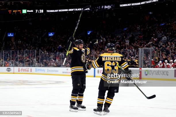 Patrice Bergeron of the Boston Bruins celebrates after scoring a goal against the Detroit Red Wings during the first period at TD Garden on November...