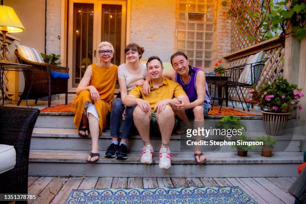 informal family portrait in backyard - illinois family stock pictures, royalty-free photos & images