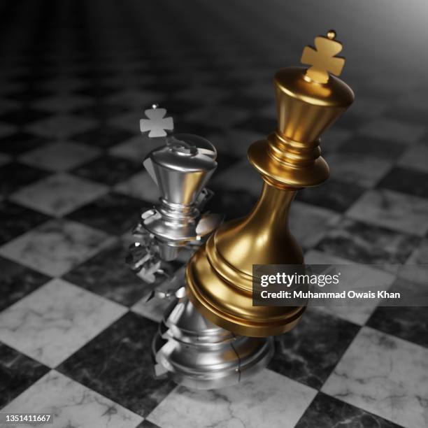 silver chess king broken by a gold king - norway chess stock pictures, royalty-free photos & images