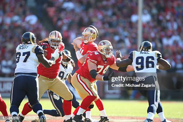 Mike Iupati and Joe Staley of the San Francisco 49ers block for Alex Smith during the game against the St. Louis Rams at Candlestick Park on December...