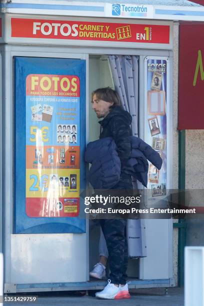 Luka Modric accompanies his eldest son, Ivano, as he has his photo taken, on 23 October 2021, in Madrid, Spain.