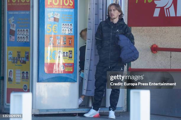 Luka Modric accompanies his eldest son, Ivano, as he has his photo taken, on 23 October 2021, in Madrid, Spain.