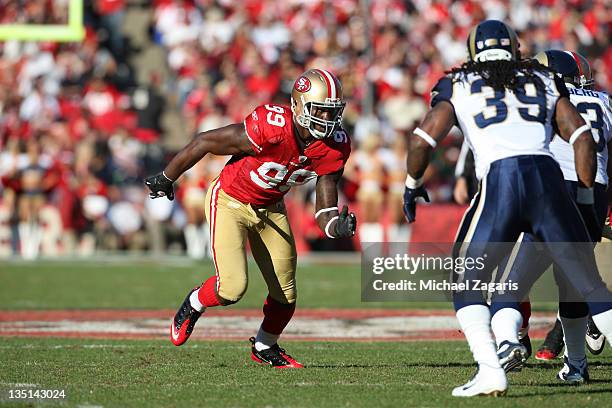 Aldon Smith of the San Francisco 49ers rushes the passer during the game against the St. Louis Rams at Candlestick Park on December 4, 2011 in San...