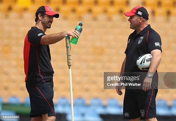 Warriors Head Coach Brian McClennan talks with skills coach Andrew Johns during a New Zealand Warriors media session at Mt Smart Stadium on December...