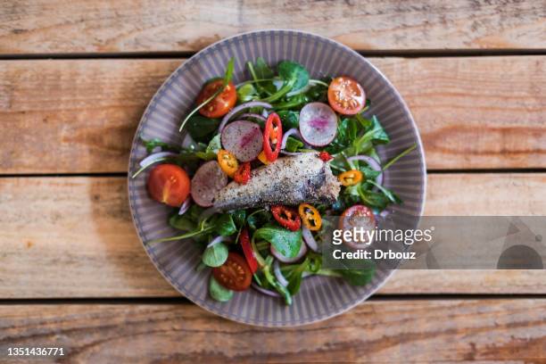 anchovy salad with vegetable on plate - mache stock pictures, royalty-free photos & images