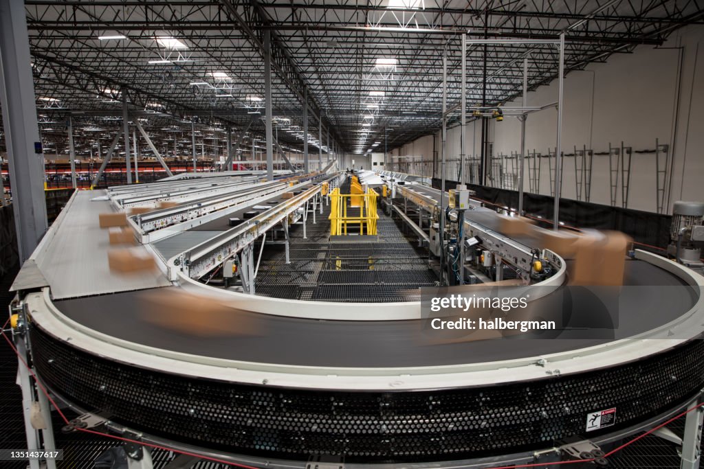 Long Exposure of Packages on Conveyor Belt