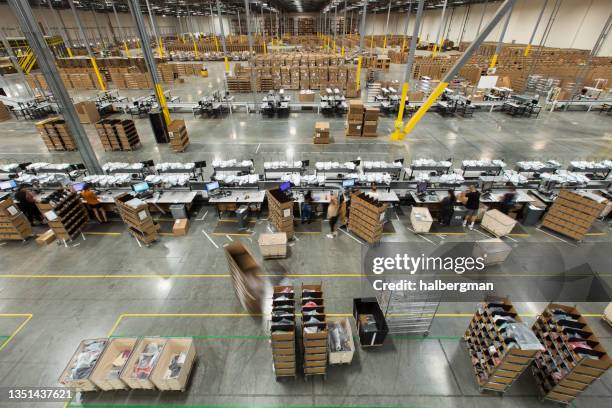 packing stations in fulfillment center - distribution warehouse stock pictures, royalty-free photos & images