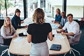 Businesswoman addressing a meeting in office
