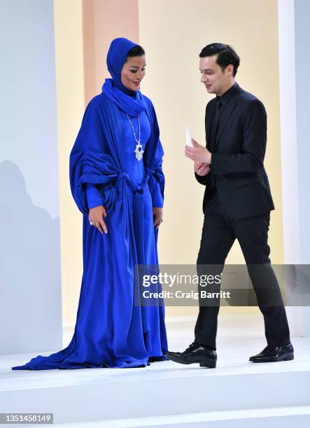 Her Highness Sheikha Moza bint Nasser and Mohamed Benchellal appear onstage at the Fashion Trust Arabia Prize Gala on November 3, 2021 at the...