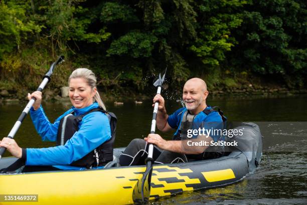 row your boat - inflatable stock pictures, royalty-free photos & images