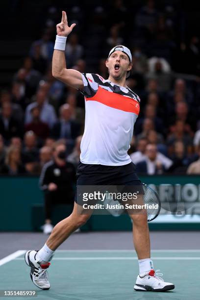 James Duckworth of Australia celebrates winning the 2nd set during his singles match against Hubert Hurkacz of Poland on Day Four of the Rolex Paris...