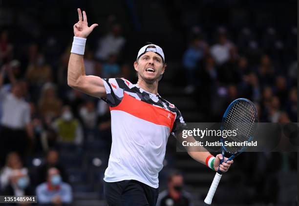 James Duckworth of Australia celebrates winning the 2nd set during his singles match against Hubert Hurkacz of Poland on Day Four of the Rolex Paris...