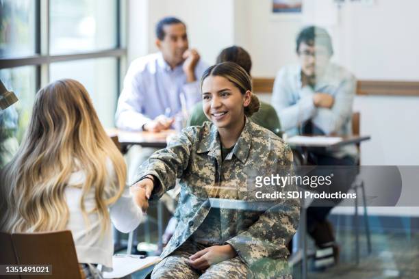 young soldier greets counselor - military recruitment stock pictures, royalty-free photos & images