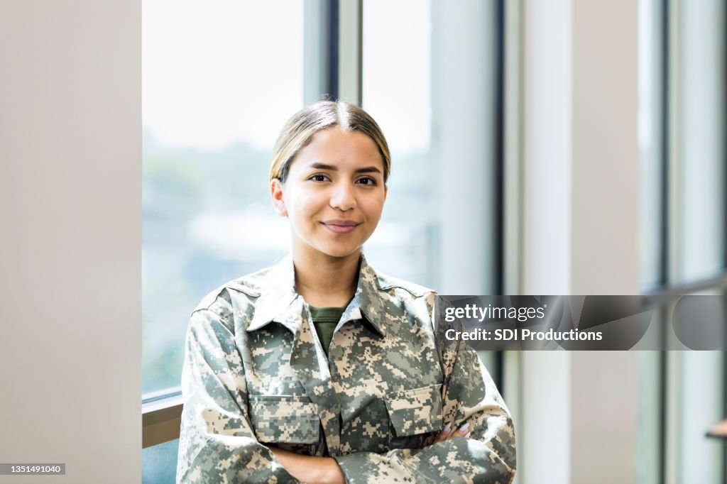 Portrait of cheerful female soldier