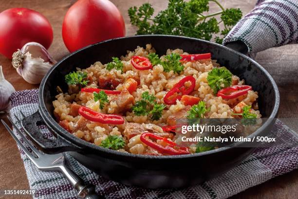 high angle view of food in bowl on table - risoto stockfoto's en -beelden