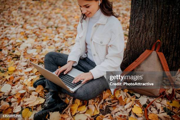 work in the autumn park - october 22 stock pictures, royalty-free photos & images