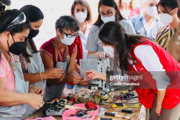 In this Handout image provided by the Spanish Royal Household, Queen Letizia of Spain visits the 'Bañado Sur' Family Care Center on November 4, 2021...