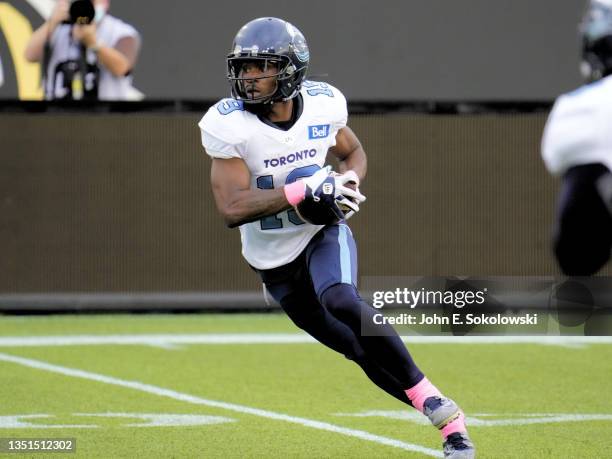 Kurleigh Gittens Jr. #19 of the Toronto Argonauts gains yards after a pass reception against the Hamilton Tiger-Cats at Tim Hortons Field on October...