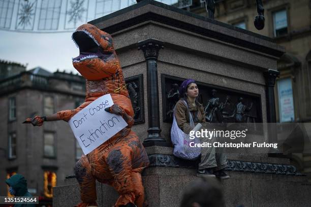 Activists listen to speakers as they attend the Fridays For Future march on November 5, 2021 in Glasgow, Scotland. Day Six of the 2021 climate summit...