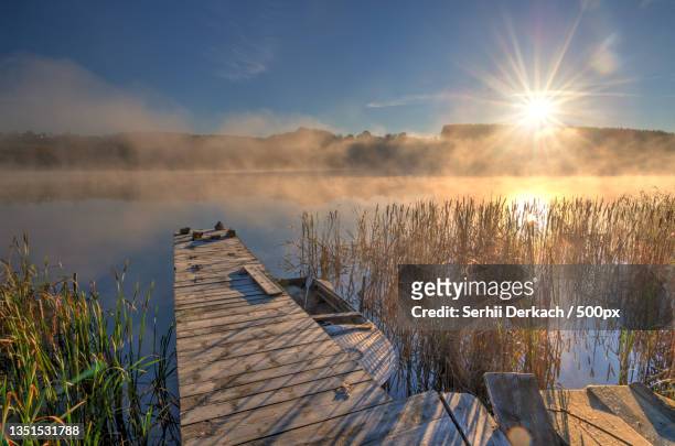 scenic view of lake against sky during sunset,ukraine - idyllic lake bildbanksfoton och bilder
