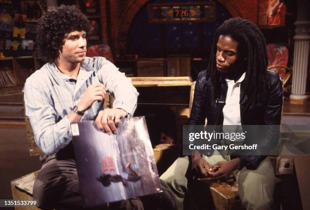 View of American VJ Mark Goodman and Guyanese-British Pop and Reggae musician Eddy Grant during an interview at MTV Studios, New York, New York,...