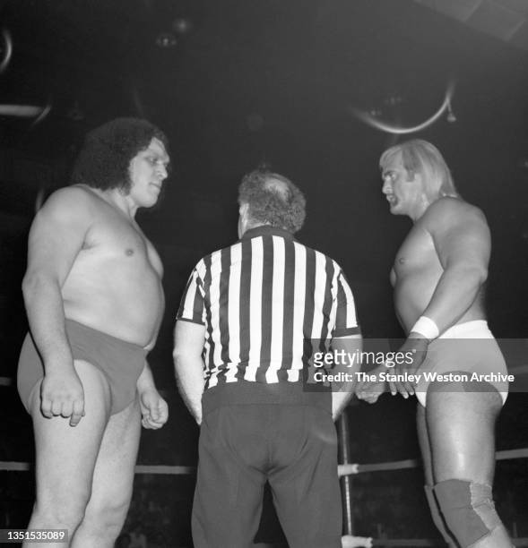 International Wrestling Title event featuring Hulk Hogan and Andre Giant. Pictured here is Andre Giant referee and Hulk Hogan as they square off...