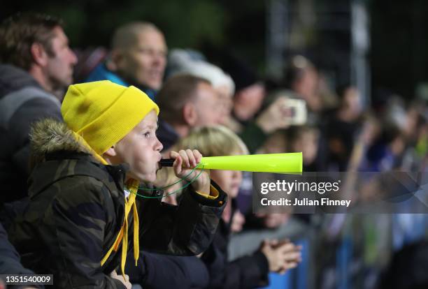 Young AFC Sudbury fan blows his Vuvuzela prior to the Emirates FA Cup First Round match between AFC Sudbury and Colchester United at The MEL Group...