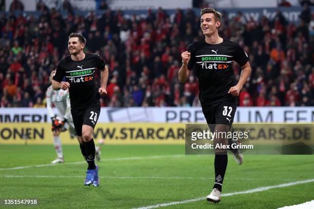 Florian Neuhaus of Borussia Monchengladbach celebrates after scoring their side's first goal during the Bundesliga match between 1. FSV Mainz 05 and...