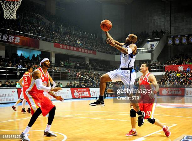 Basket-CHN-CBA-Marbury,FOCUS by Robert Saiget Stephon Marbury of Beijing jumps Ducks jumps during a 2011/2012 season match against Xijiang team of...