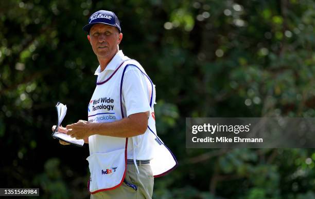 Caddie for Justin Thomas of the United States, Jim "Bones" Mackay looks on from the seventh tee during the second round of the World Wide Technology...