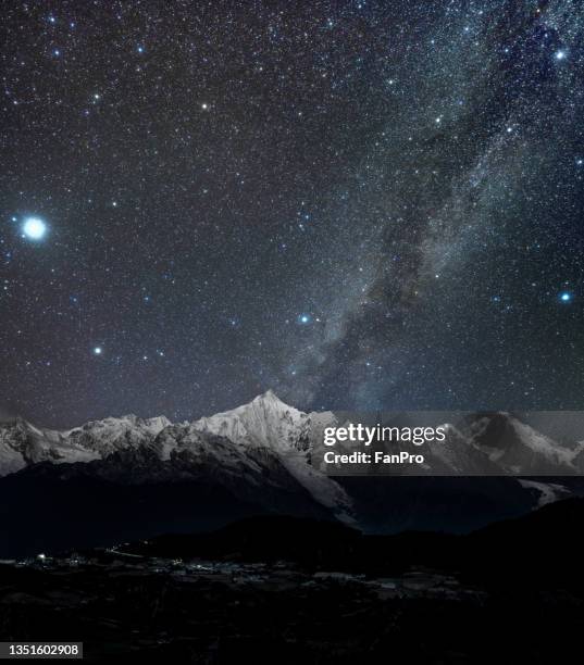 snow mountain and milky way - yunnan province stock pictures, royalty-free photos & images